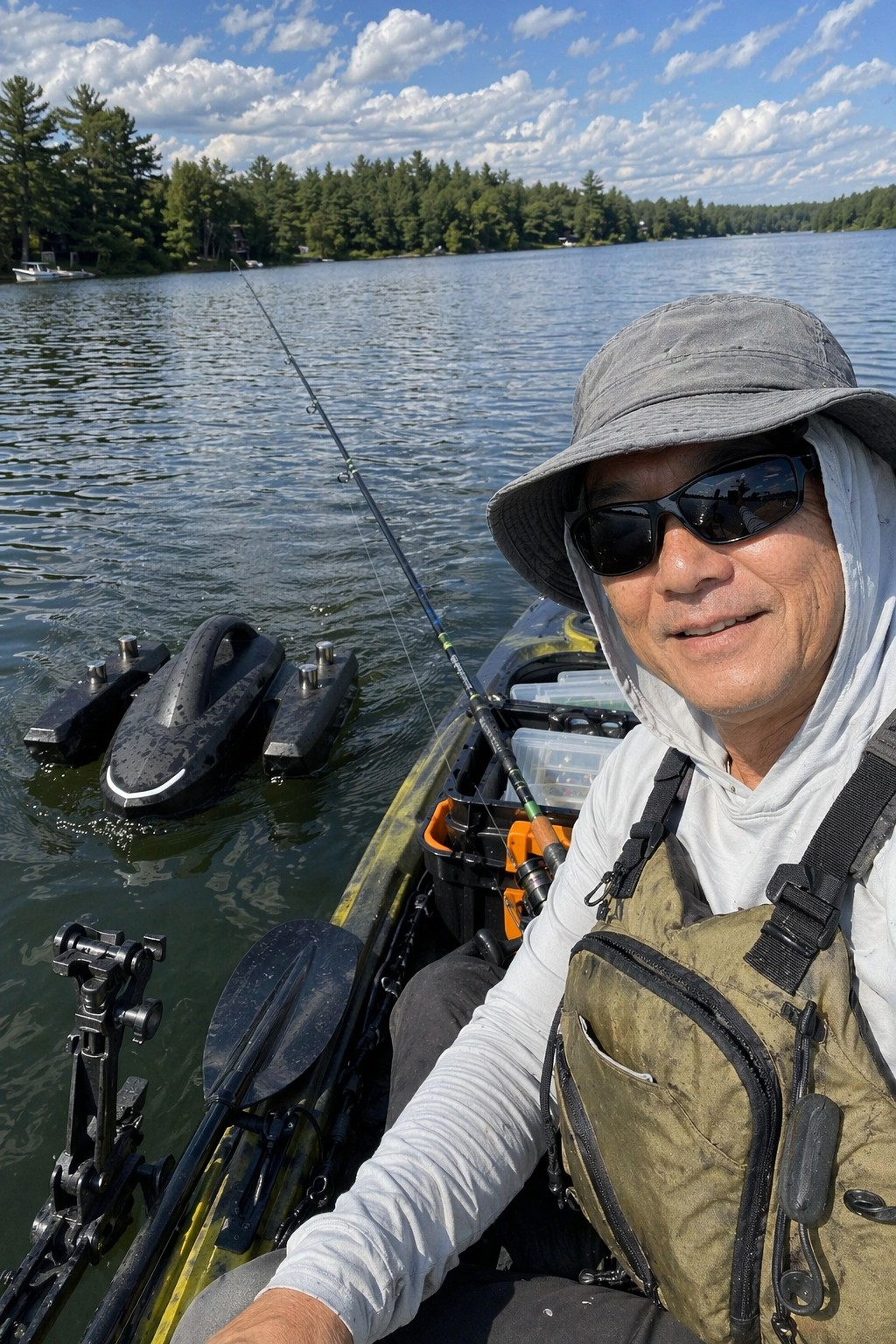 Kayak angler using Kastave beside open lake water